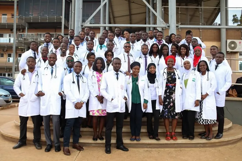 DELSU Medical Laboratory Science graduates celebrating at convocation ceremony, ready for professional practice