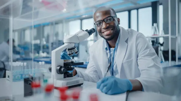 Medical Laboratory Scientist analyzing samples at DELSU's modern diagnostic laboratory facility